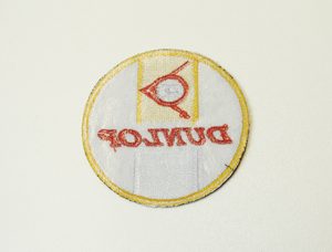 Stofmærke Ø75mm DUNLOP i den bedste kvalitet med klæber
